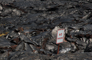 No parking sign engulfed by lava 